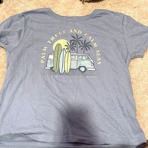 This is a Roxy shirt, xs in womens! Palm trees and a van in the Cover art :)